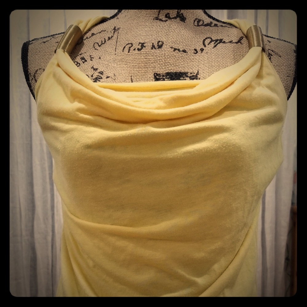 Woman shirt with metal straps